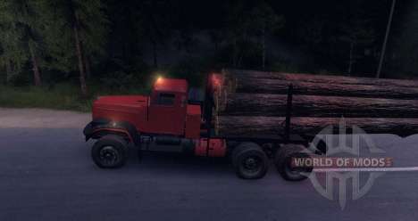 KrAZ madeira caminhão na estrada para Spin Tires