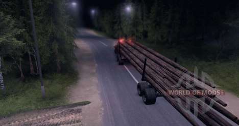 KrAZ madeira caminhão na estrada para Spin Tires